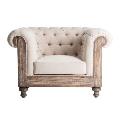 sillón vintage en resistente madera tropical y tapizado en un delicado color beige.