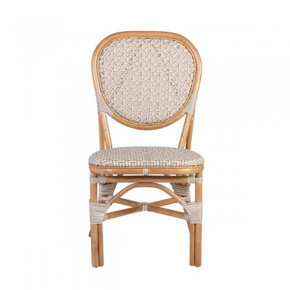 Silla de ratán blanco apilable de la colección BISTRO, realizada a mano